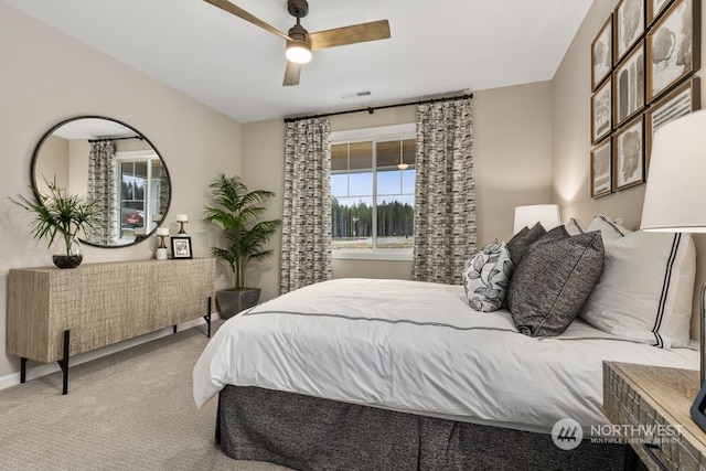 bedroom featuring ceiling fan and carpet floors