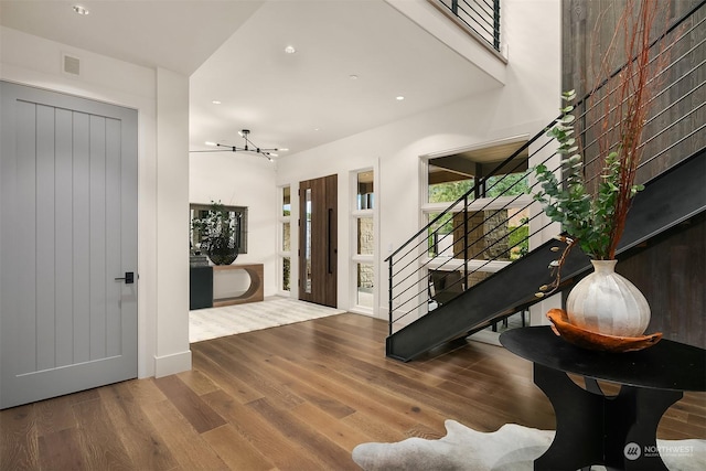 entryway with wood-type flooring