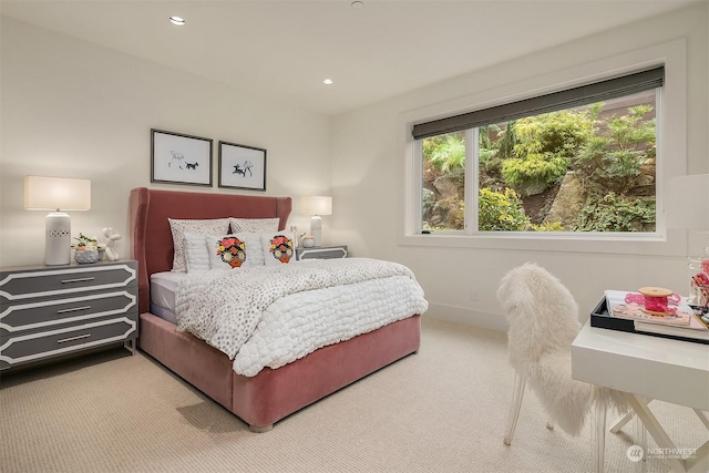 bedroom with light carpet