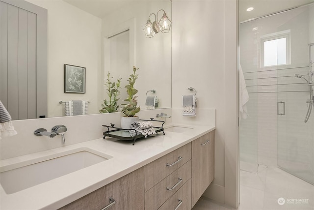 bathroom with vanity and an enclosed shower