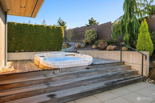 exterior details featuring a jacuzzi