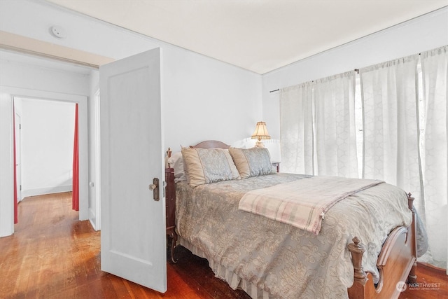 bedroom featuring wood-type flooring