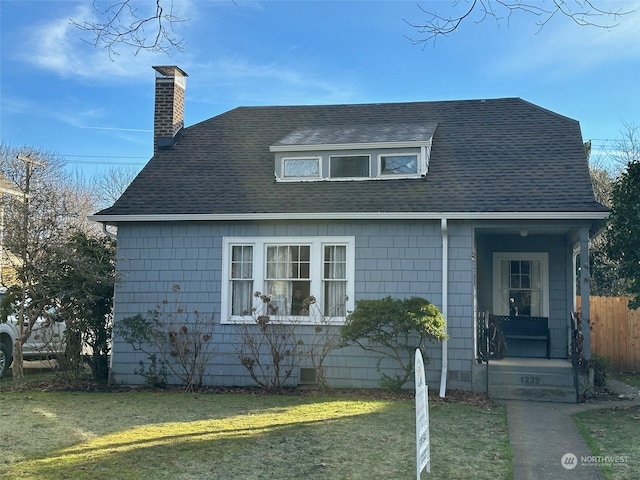 view of front of home with a front yard