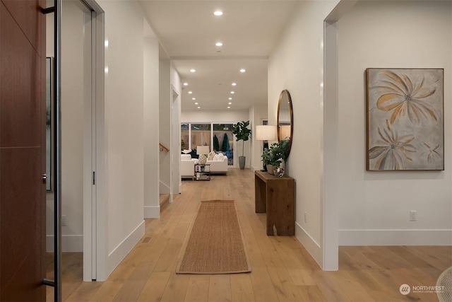 corridor featuring light wood-type flooring