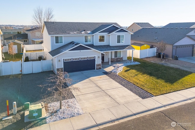 front facade featuring a garage and a front yard