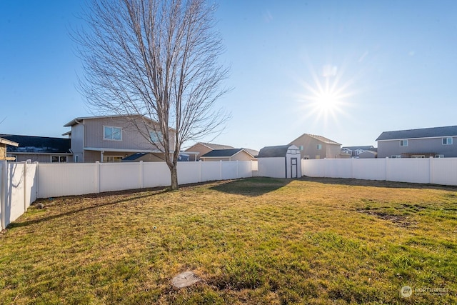 view of yard with a storage unit