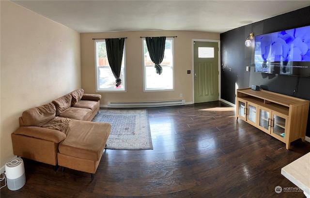 living room featuring dark hardwood / wood-style flooring and a baseboard heating unit