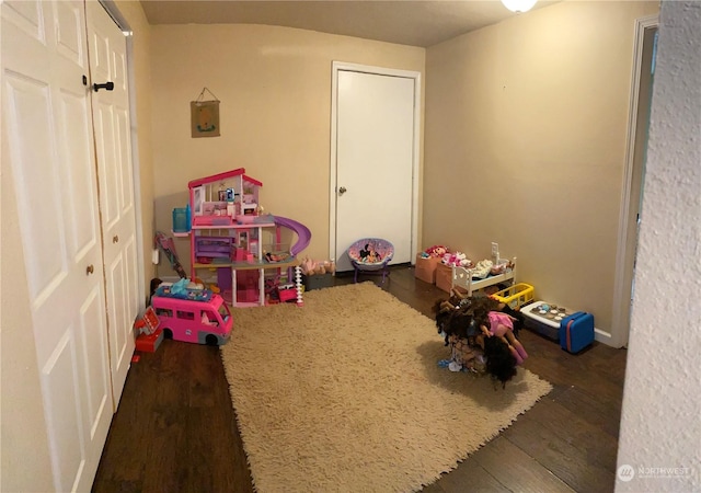 recreation room featuring dark hardwood / wood-style flooring