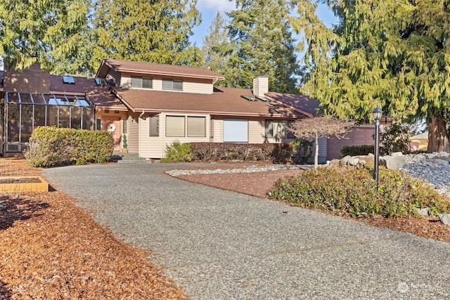 front of property with a sunroom