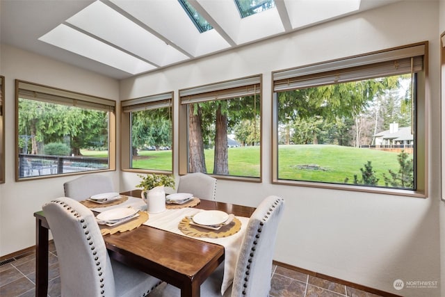 sunroom featuring a skylight