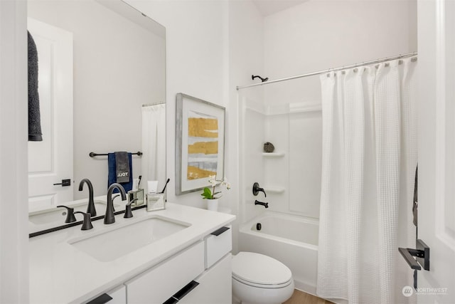 full bathroom with toilet, shower / bath combination with curtain, and vanity