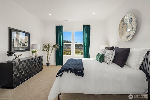 carpeted bedroom featuring visible vents and recessed lighting