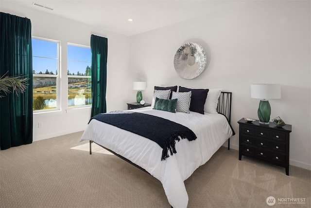 bedroom with light carpet, baseboards, visible vents, and recessed lighting