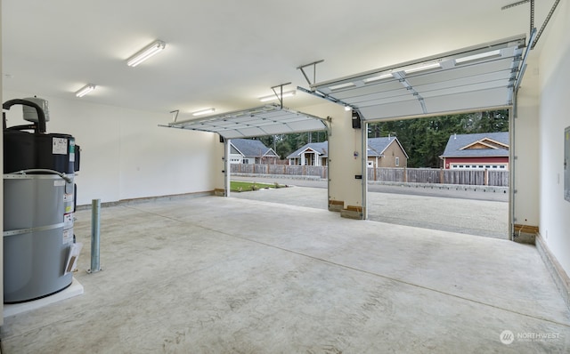 garage with strapped water heater