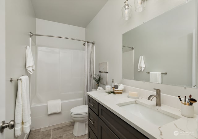 full bathroom featuring vanity, toilet, and shower / bath combo