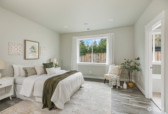 bedroom featuring hardwood / wood-style flooring