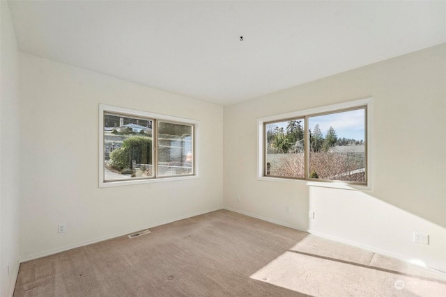 view of carpeted spare room