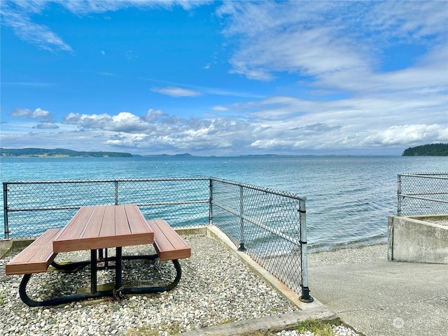 exterior space with a water view