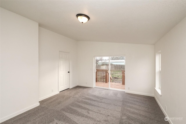 empty room featuring carpet flooring