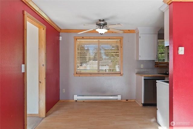 kitchen featuring crown molding, light hardwood / wood-style flooring, a baseboard heating unit, ceiling fan, and white cabinets