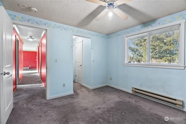 unfurnished bedroom featuring dark carpet, a baseboard radiator, a textured ceiling, and ceiling fan