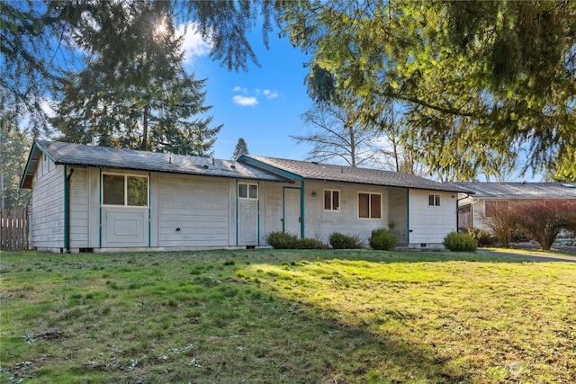 ranch-style house with a front yard