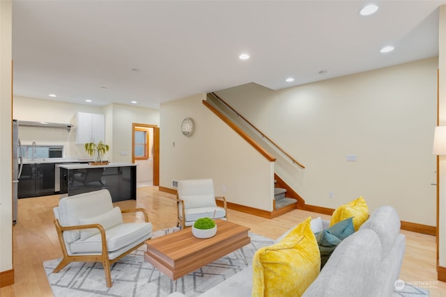 living room featuring light wood-type flooring