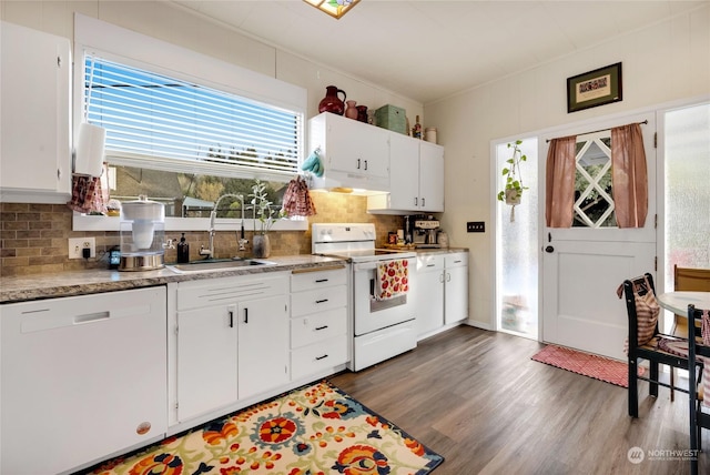 kitchen featuring sink, backsplash, white cabinets, dark wood-type flooring, and white appliances