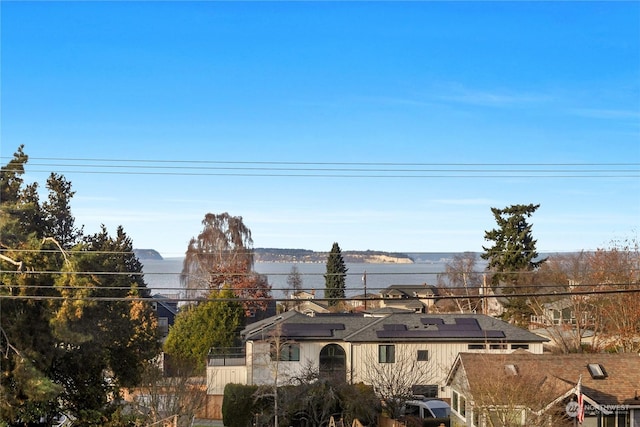 property's view of city with a water view