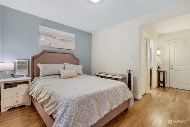 bedroom featuring light hardwood / wood-style flooring