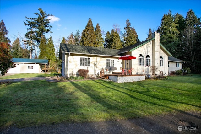 ranch-style home with a front lawn