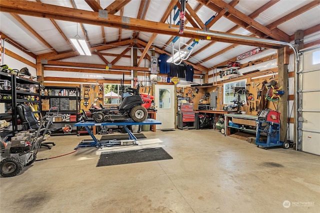 garage featuring a workshop area