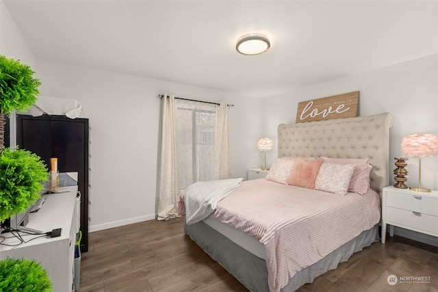 bedroom featuring hardwood / wood-style floors