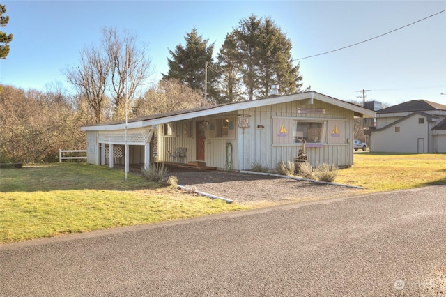 ranch-style house with a front yard