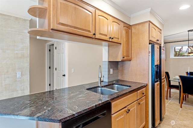 kitchen featuring sink, ornamental molding, dishwasher, pendant lighting, and dark stone counters