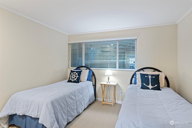 carpeted bedroom featuring crown molding