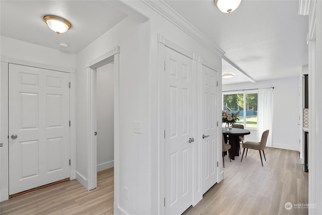 hallway featuring light hardwood / wood-style flooring