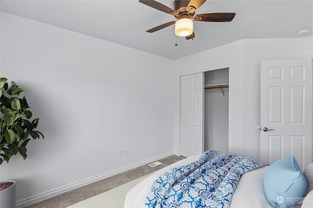 bedroom featuring a closet, ceiling fan, and carpet flooring