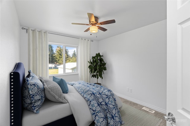 carpeted bedroom featuring ceiling fan