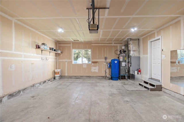 garage with strapped water heater and a garage door opener