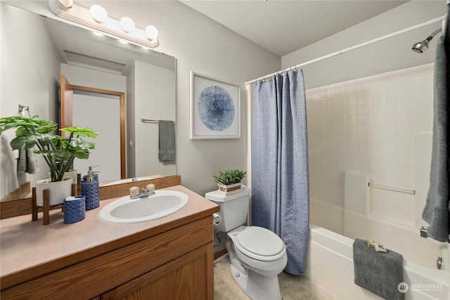 full bathroom with vanity, toilet, and shower / bath combo