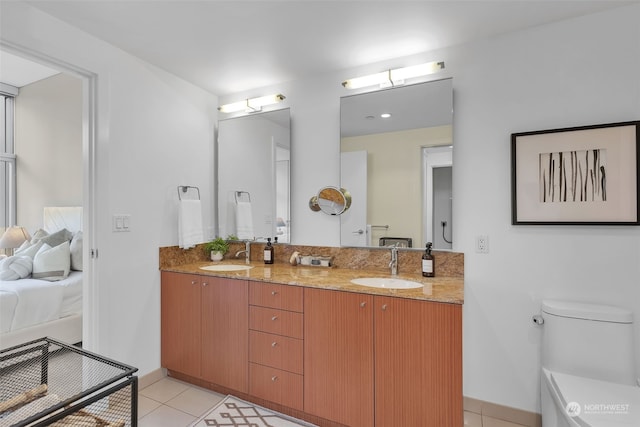 bathroom featuring vanity and tile patterned flooring