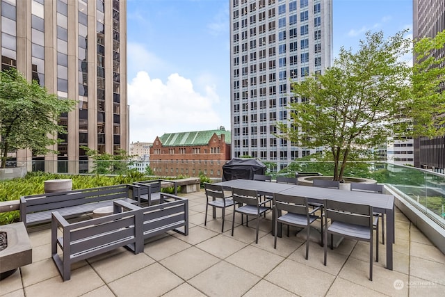 view of patio featuring a balcony