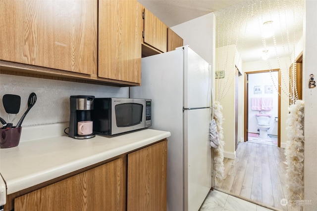 kitchen with white fridge