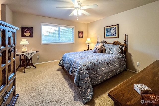 bedroom with ceiling fan and carpet floors