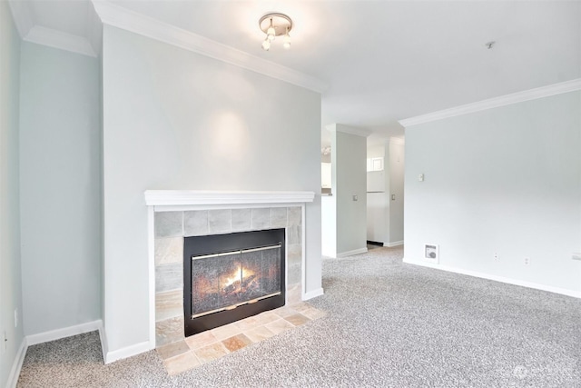 unfurnished living room featuring light carpet, crown molding, and a tile fireplace