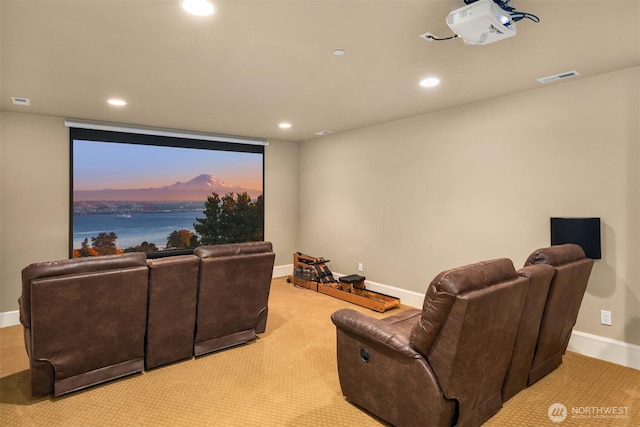 cinema room featuring recessed lighting, visible vents, baseboards, and light colored carpet