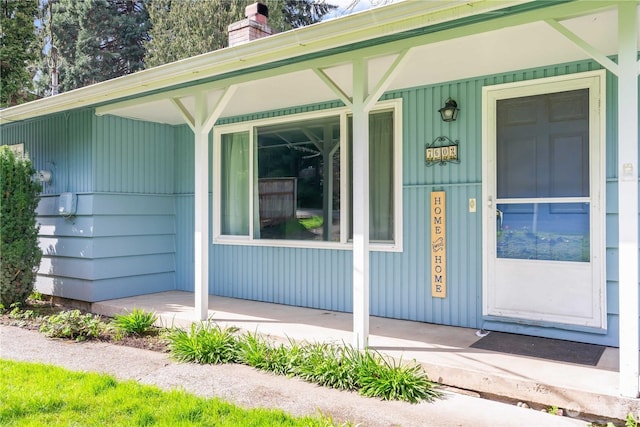 entrance to property with covered porch