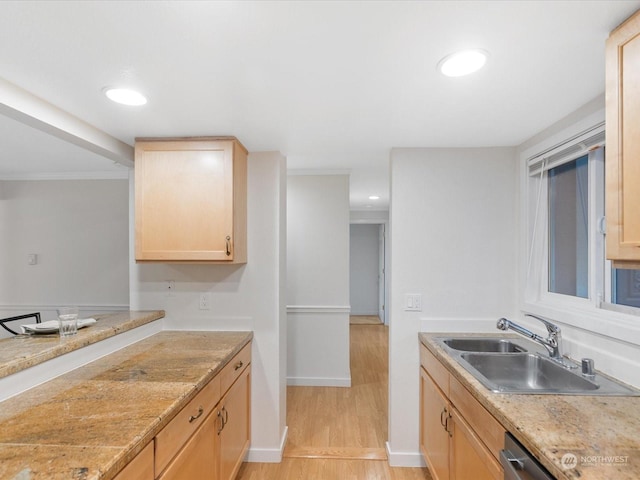 kitchen featuring dishwasher, light hardwood / wood-style floors, sink, light brown cabinets, and ornamental molding