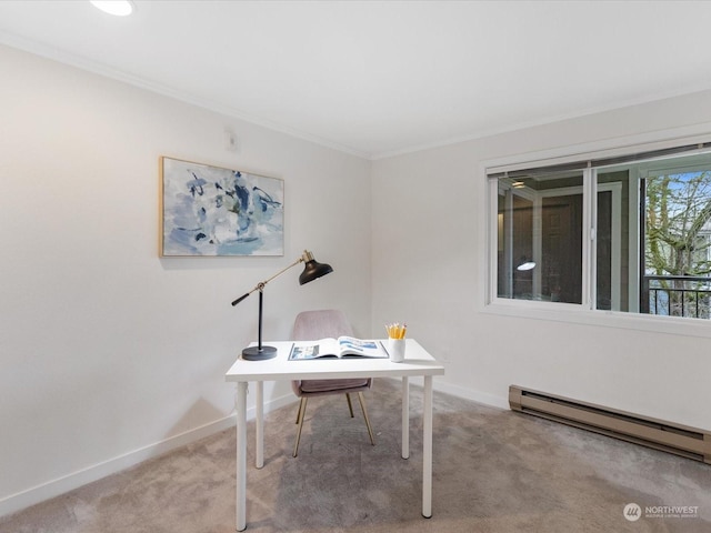 office space with baseboard heating, carpet flooring, and ornamental molding